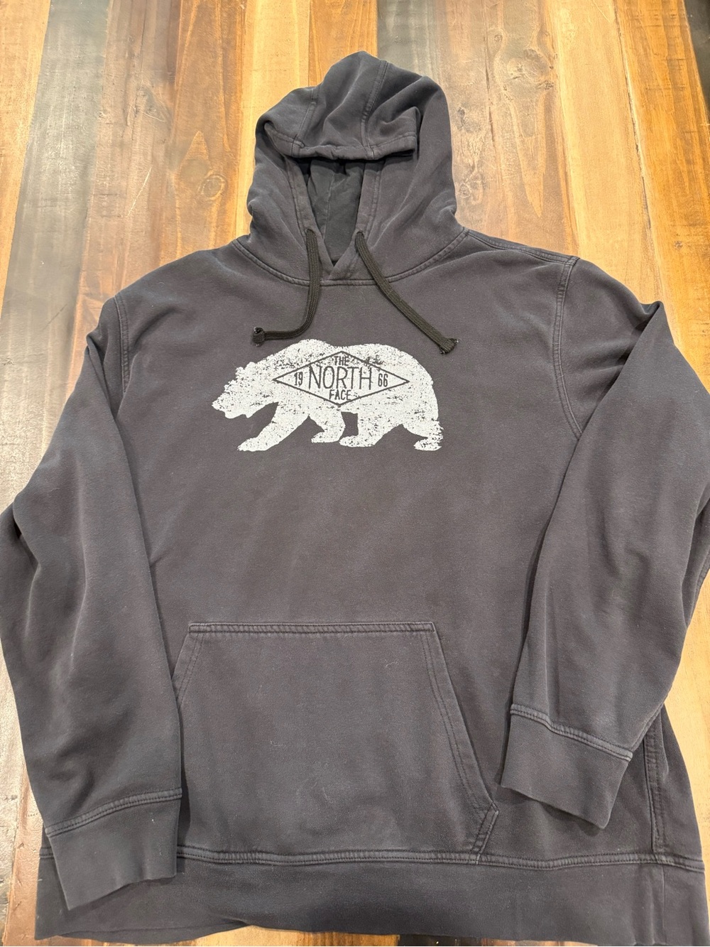 The North Face Men's Black Hoodie with White Bear Logo